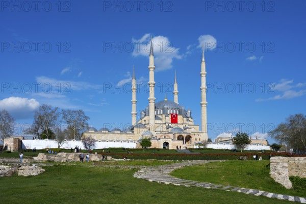 Mosque with dominant minarets and a spacious garden in front of it. Clear day with blue sky. Selimiye Mosque, Edirne Selimiye Camii, Ottoman architecture, UNESCO World Heritage Site, Edirne, Eastern Thrace, Turkey