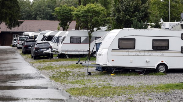 Rainy summer day on a campsite, caravans standing next to each other in cloudy wet weather, Nesselwang, 28.07.2025, Nesselwanf