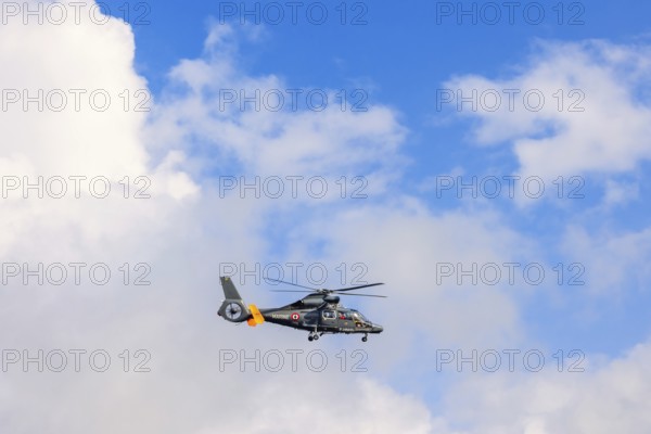 French navy helicopter flying in the sky, Bretagne, France
