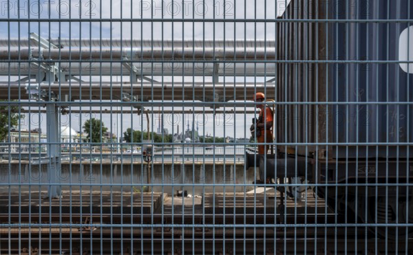 Lattice fence on the factory bridge over the River Main in Kelsterbach, Hesse, Germany