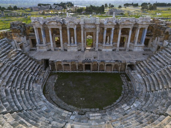 A well-preserved ancient theatre with stone tiers and an impressive façade, amphitheatre, aerial view, Hierapolis, Pamukkale, Denizli, Anatolia, Turkey