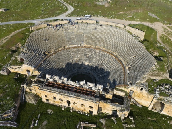 A theatre in an ancient city, surrounded by green hills and impressive architecture, amphitheatre, aerial view, Hierapolis, Pamukkale, Denizli, Anatolia, Turkey