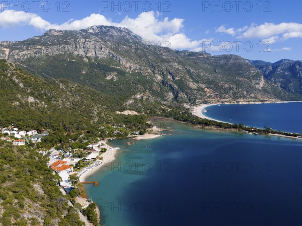 A picturesque coastal landscape with blue sea, beach and majestic mountains, Fethiye, Mugla, Mugla, Aegean, Turkey