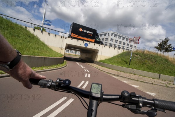 Roundabout in the Dutch city of Houten, the lanes for cars and bicycles are separated, the cycle path runs under the car lane, through subways, so that cyclists and cars can pass the intersection separately, in Houten, bicycle traffic has priority, considered a model city for modern bicycle traffic, Netherlands