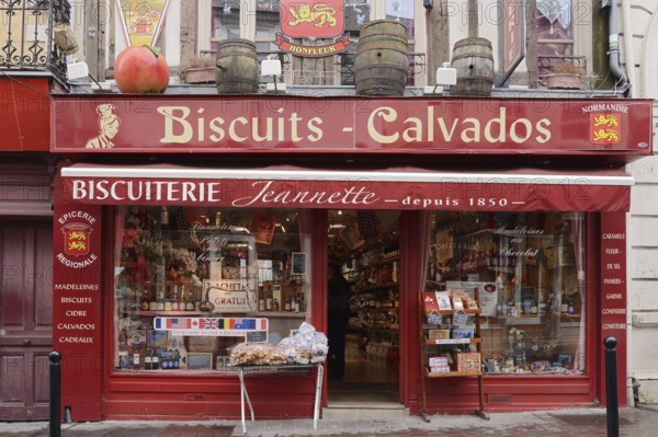 Shop window of a biscuit and Calvados shop, Honfleur, Cote Fleurie, Pays d'Auge, Département Calvados, Normandy, France