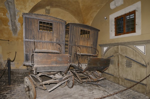 Old prison carriages, Medieval Crime Museum, Rothenburg ob der Tauber, Middle Franconia, Bavaria, Germany