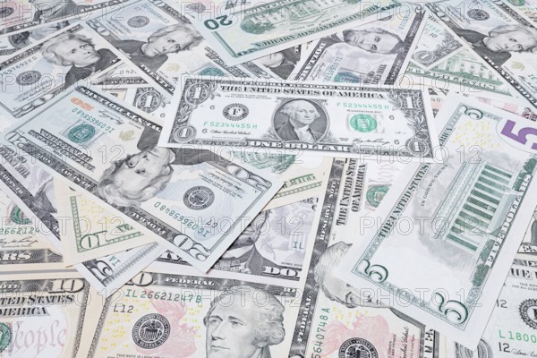 Various US dollar notes in a pile, banknotes