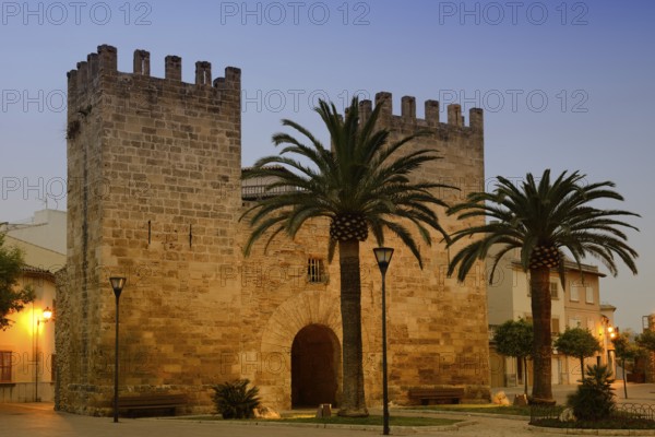 Historic city gate Porta de Moll or Porta de Xara at dawn, Alcudia, Majorca, Balearic Islands, Spain