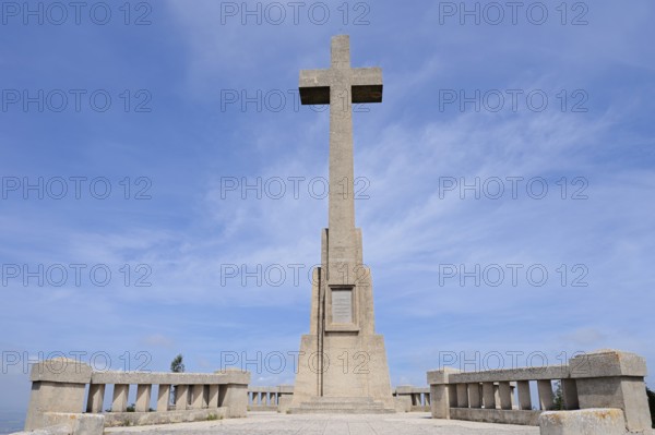 Stone cross at the Santuari de Sant Salvador monastery, Puig de Sant Salvador near Felanitx, Majorca, Balearic Islands, Spain
