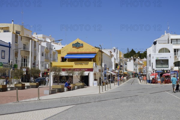 Street with houses and shops, Carvoeiro, Algarve, Portugal
