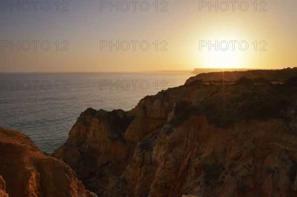 Sunset on the rocky coast, Ponta da Piedade, Lagos, Algarve, Portugal