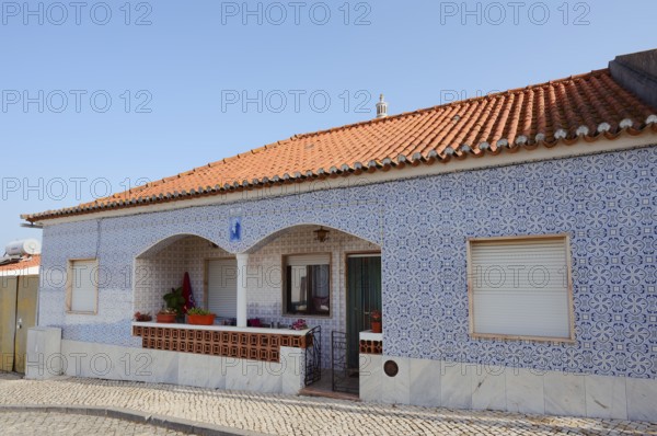 House with azulejos, ceramic tiles, Aljezur, Algarve, Portugal