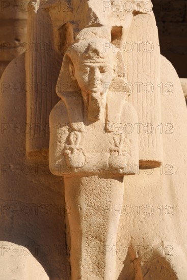 Statue of the Pharaoh in the pose of Osiris, Karnak Temple, Luxor, Egypt