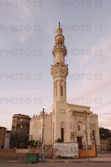 Mosque with minaret at sunrise, Esna, Egypt
