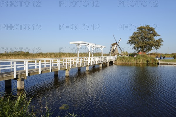 Historic windmill and drawbridge, UNESCO World Heritage Site, Kinderdijk, South Holland, Netherlands
