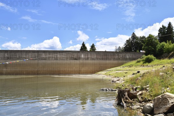 Dam at lake in the Black Forest in Forbach in Germany called Schwarzenbach Reservoir under a clear sky