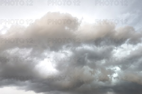 Dark discoloured storm clouds Cloud roll above grey clouds Rain clouds herald thunderstorms, international