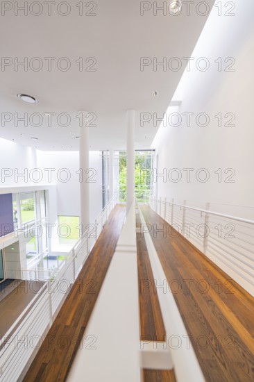 Modern, light-flooded hallway with wooden flooring and large windows, Frieder Burda Museum, Baden Baden, Germany