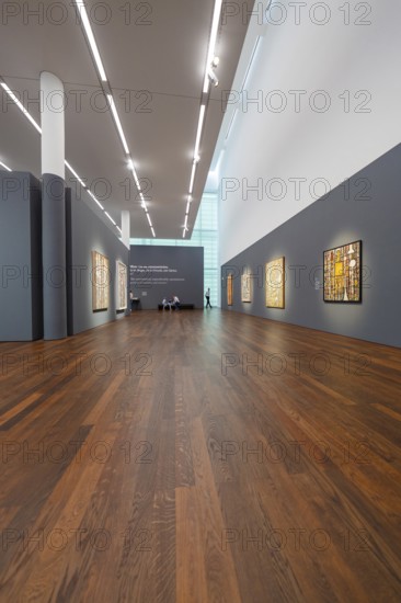 Large exhibition room with paintings on the walls and a wooden floor, Frieder Burda Museum, Baden Baden, Germany