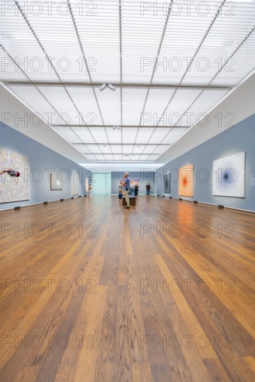 Large, illuminated gallery space with several visitors and works of art on the walls, Frieder Burda Museum, Baden Baden, Germany