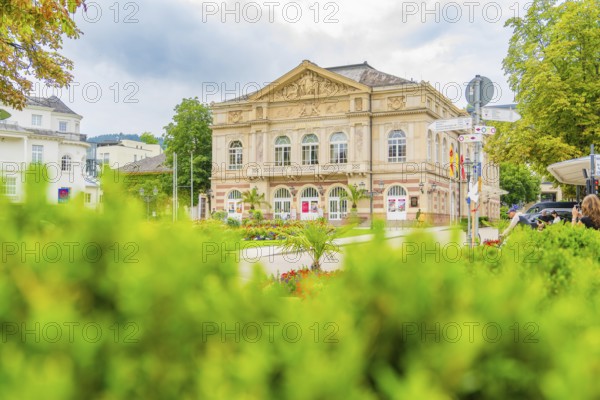 View of a magnificent building, surrounded by a well-tended garden and lots of greenery, Baden Baden, Germany