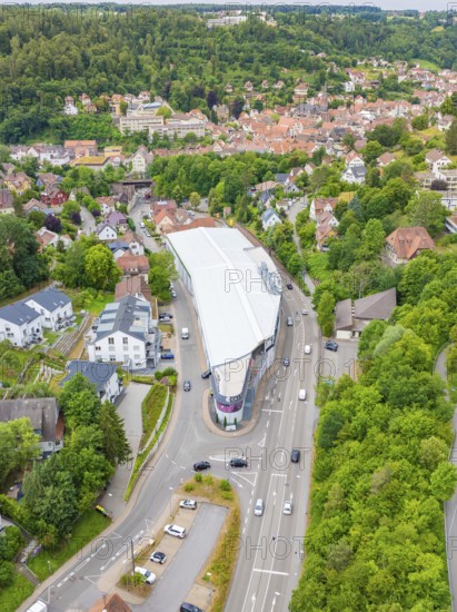 Bird's eye view of buildings and landscape between green forest and tiled roofs, City Centre Calw, Germany