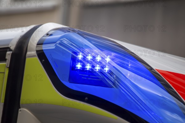 Close-up of a flashing blue light on an ambulance