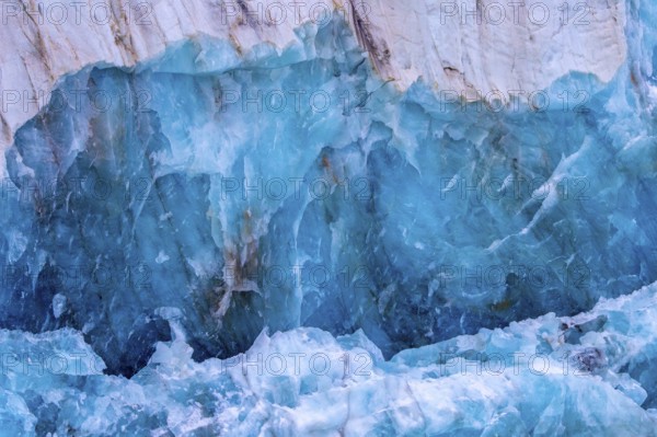 Blue ice structure of Fjortende Julibreen, 14th of July Glacier calving into Krossfjorden, Haakon VII Land, Spitsbergen, Svalbard, Norway