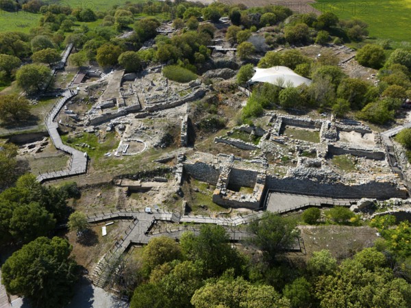 Historical ruins with ancient stone walls embedded in lush vegetation, aerial view, Troy, Troia, ancient city, site of the Trojan War, UNESCO World Heritage Site, Turkey