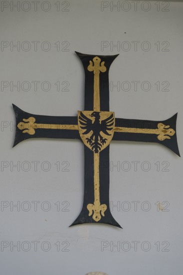 Grand Master's Cross, heraldic cross and emblem as a sign of rank and dignity, inner courtyard of the House of the Teutonic Order in Vienna, Austria, for editorial use only