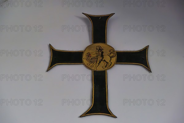 Samson kills the lion, depiction of a biblical scene on a cross, Deutschordenshaus in Vienna, Austria, for editorial use only