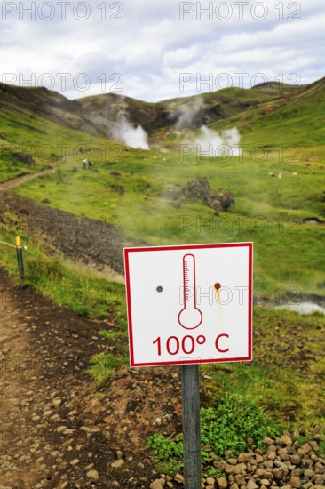 Sign with inscription 100 degrees Celsius, warning, boiling hot water, steaming valley, bathing place Reykjadalur, Hveragerði, Hveragerdi, Golden Circle, ring road, Iceland