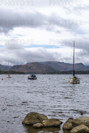 Boats on Ullswater Lake, Pooley Bridge, Lake District National Park, Cumbria, England, United Kingdom
