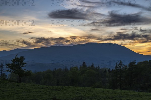 Sunset over Mountains in Lake District National Park over Coniston Water, Cumbria, England, United Kingdom