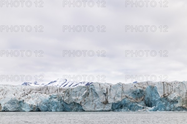 Glacier tongue, mountain top, sea, Konowbreen, Spitsbergen, Svalbard