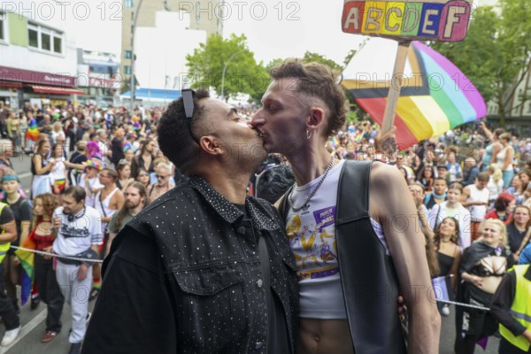 Two kissing men at the 47th Christopher Street Day under the motto Never be quiet again in Berlin on 26 July 2025