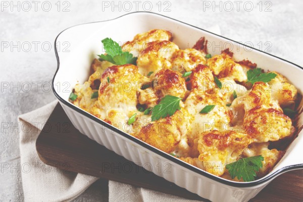 Baked cauliflower, in cream sauce, with cheese and spices, homemade, no people