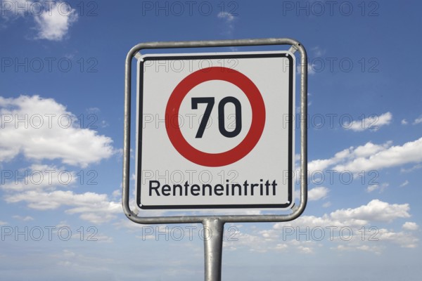 (Photomontage) Traffic sign with the inscription RENTAL ENTRANCE 70, detached in front of a blue sky