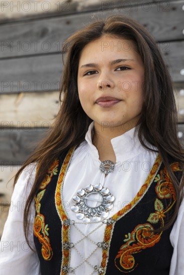 Young woman in traditional traditional costume at the reception for King Harald at the end of coal mining, portrait, Longyearbyen, Spitsbergen