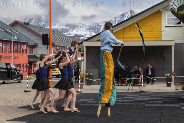 Children's group performing gymnastics at the reception for King Harald at the end of coal mining, portrait, Longyearbyen, Spitsbergen