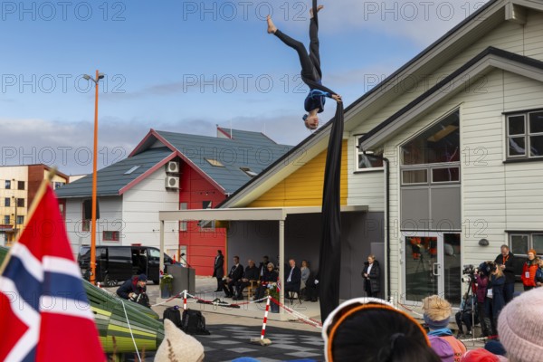 Aerial acrobatics, girls, catch for King Harald as part of the end of coal mining, Longyearbyen, Spitsbergen