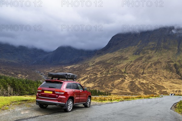 Off road 4x4 car with roof tent on Fairy Pools and Waterfalls, Glen Brittle, Black Cuillin, Isle of Skye, Scotland, UK