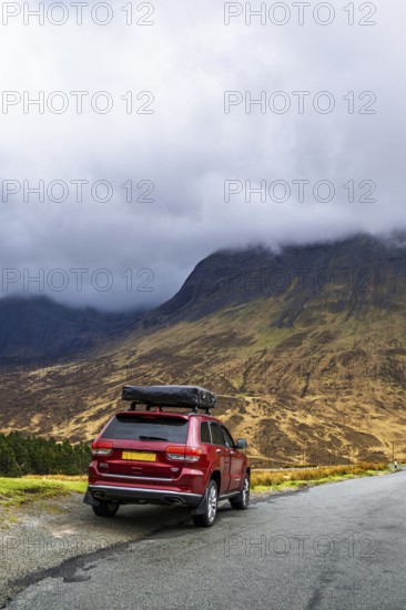 Off road 4x4 car with roof tent on Fairy Pools and Waterfalls, Glen Brittle, Black Cuillin, Isle of Skye, Scotland, UK