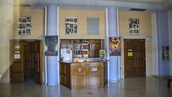 Cinema, An interior with bar, art posters and columns in a cosy ambience, Armando Bernabiti, Historicism, Rationalism, Art Deco, Rationalism, Rodolfo Petraco, Fascism, Portolago, Lakki, Leros, Dodecanese, Greek Islands, Greece