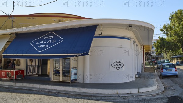Fish market, A shop with a blue canopy on a street corner, Modern architecture, Armando Bernabiti, Historicism, Rationalism, Art Deco, Rationalism, Rodolfo Petraco, Fascism, Portolago, Lakki, Leros, Dodecanese, Greek Islands, Greece