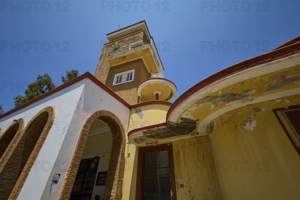 Market Hall, Agora, Historical building with vaulted arches and aged walls under a bright sky, Armando Bernabiti, Historicism, Rationalism, Art Deco, Rationalism, Rodolfo Petraco, Fascism, Portolago, Lakki, Leros, Dodecanese, Greek Islands, Greece
