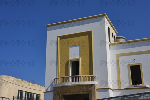 Modern building with geometric design and clear edges under a clear blue sky, Armando Bernabiti, Historicism, Rationalism, Art Deco, Rationalism, Rodolfo Petraco, Fascism, Portolago, Lakki, Leros, Dodecanese, Greek Islands, Greece