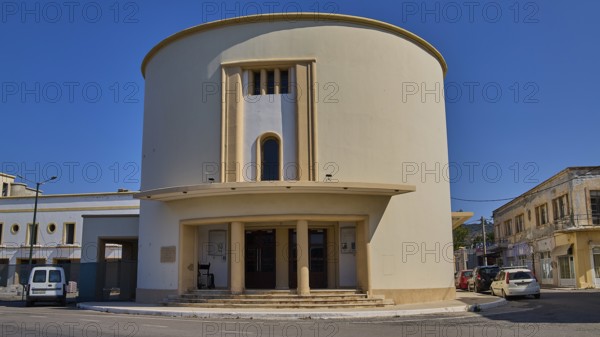 Theatre, Cinema, Round modern building with columns, surrounded by urban environment, Armando Bernabiti, Historicism, Rationalism, Art Deco, Rationalism, Rodolfo Petraco, Fascism, Portolago, Lakki, Leros, Dodecanese, Greek Islands, Greece