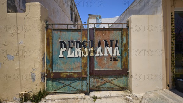 Persiana, Rusty Tor with the lettering Persiana on a dilapidated building, Armando Bernabiti, Historicism, Rationalism, Art Deco, Rationalism, Rodolfo Petraco, Fascism, Portolago, Lakki, Leros, Dodecanese, Greek Islands, Greece