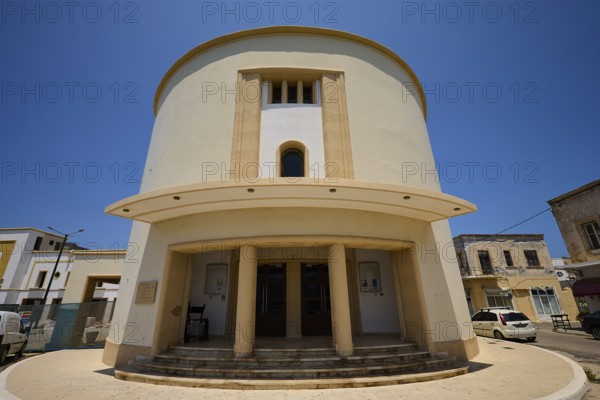 Theatre, Cinema, Round modern building with columns and a blue sky in the background, Armando Bernabiti, Historicism, Rationalism, Art Deco, Rationalism, Rodolfo Petraco, Fascism, Portolago, Lakki, Leros, Dodecanese, Greek Islands, Greece